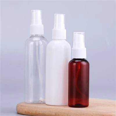 Flixkun tal-plastik tond vojt bi mini sprayer abjad ċar abjad